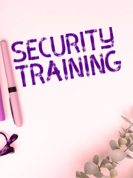 Sign displaying Security Training, Word Written on providing security awareness training for end users