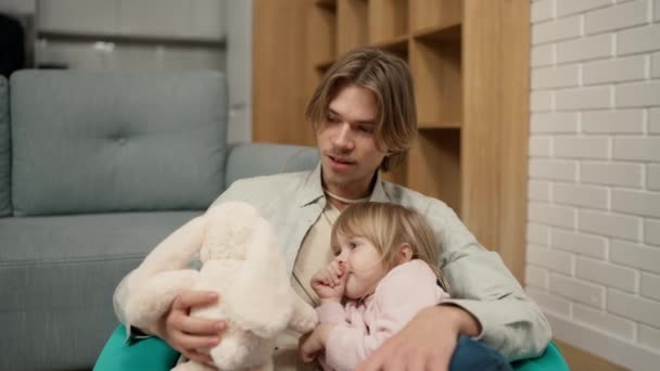 Father Daughter Play Together Soft Toy Sitting Chair — Stockvideo