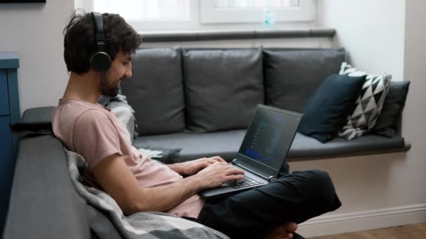 Caucasian Man Headphones Typing Laptop Home Social Media Comminication — ストック動画