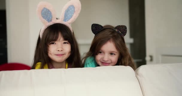 Caucasian Asian Looking Female Preschoolers Smiling Camera Wearing Funny Bunny — Stock Video