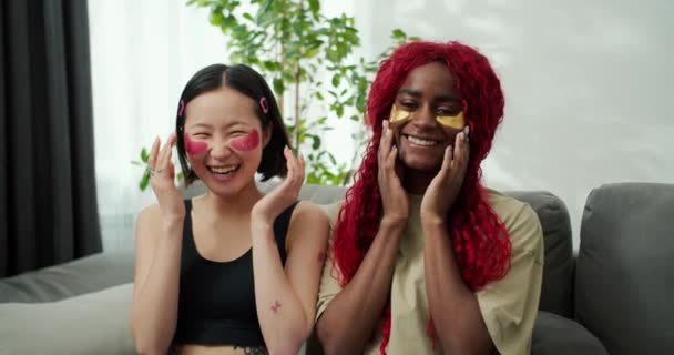 Two Young Beautiful Multiethnic Women Patches Eyes Home — Stock Video