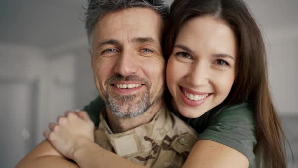Girl Hugs Supports Soldier Taking Close Portrait — Stock Video
