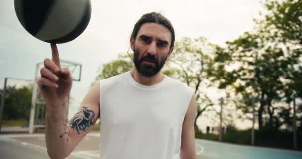 Portrait Serious Man White Shirt Beard Who Spins Basketball His — Stok Video
