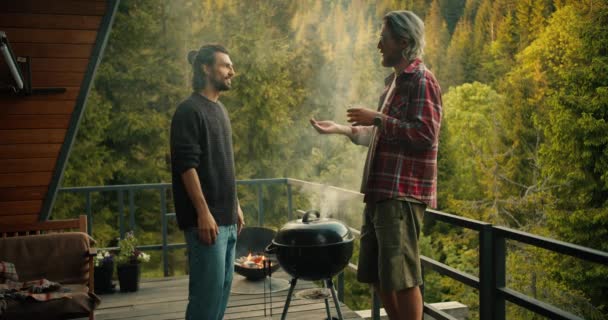 Couple Friends Chat While Cooking Grill Brunette Guy Green Sweater — Stock Video