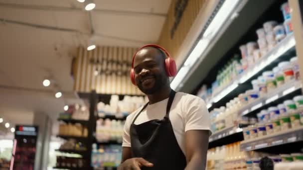 Close Shot Black Skinned Man Red Headphones Black Apron Dancing — Stock Video