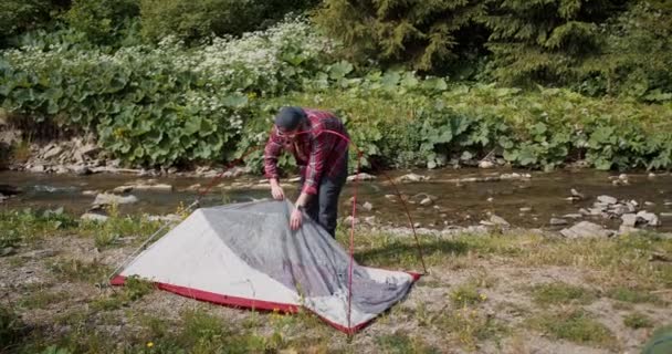 Review Guy Red Plaid Shirt Who Assembles Tent His Hike — Stock Video