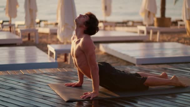 Bare Chested Guy Took Special Strip Yoga Meditation Sunny Beach — Stock Video