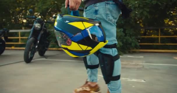 Close Shot Professional Biker Carrying Motorcycle Helmet His Hands Preparing — Stock Video