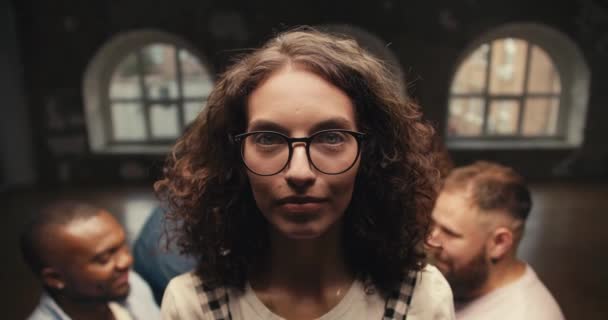 Portrait Brunette Girl Curly Hair Glasses Who Looks Camera Falls — Stock Video