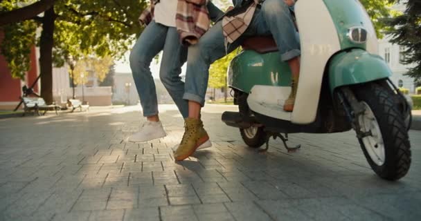 Close Shot Guy Jeans Sitting Green Moped His Girlfriend Checkered — Stock Video