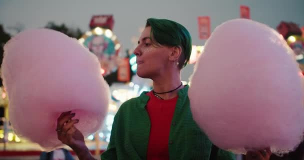 Lesbian Girl Short Green Haircut Green Shirt Holds Huge Pink — Stock Video