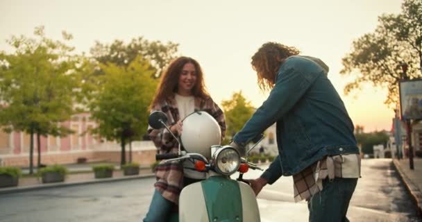 Girl Turns Shirts Curly Brown Hair Gets Her Green Moped — Stock Video