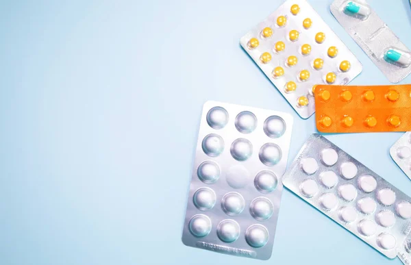 Close View Scattered Blister Packs Different Pills Blue Background — Fotografia de Stock