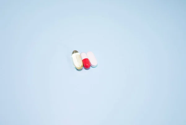 Spilled Medications Pills Blue Background Pharmacology Medicine Struggle Health —  Fotos de Stock