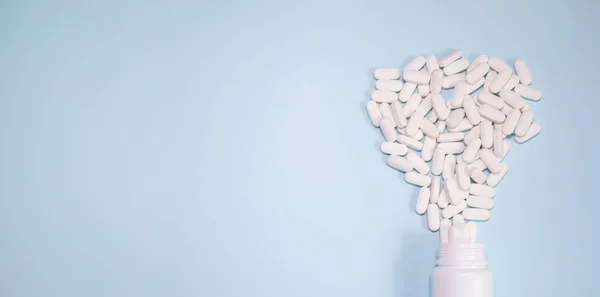 Medicine Bottle Pills Spilled Light Blue Background Medicines Prescription Pills — стоковое фото
