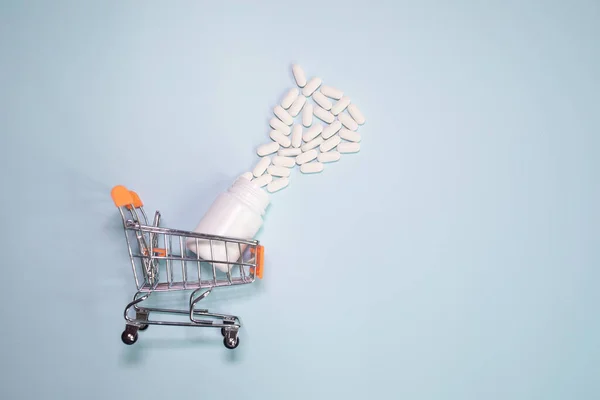 Shopping Cart Pills Tablets Light Background — Stok fotoğraf