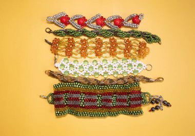 Beads, Jewelry, beads necklaces on yellow background  