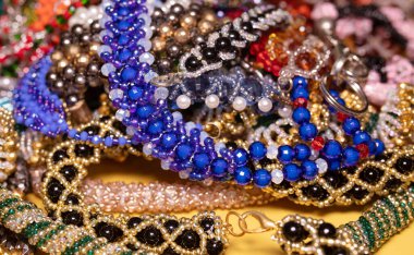Beads, Jewelry, beads necklaces on yellow background  