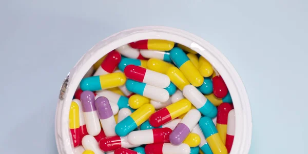 Assorted Pharmaceutical Medicine Pills Tablets Capsules Bottle Blue Background Top — Stock fotografie