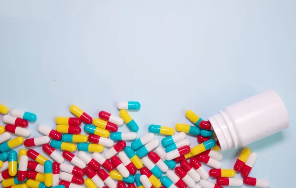 Medicine Bottle Pills Spilled Light Blue Background Medicines Prescription Pills — Stok fotoğraf