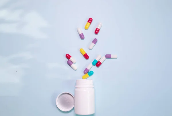Medicine Bottle Pills Spilled Light Blue Background Medicines Prescription Pills — Stock Photo, Image