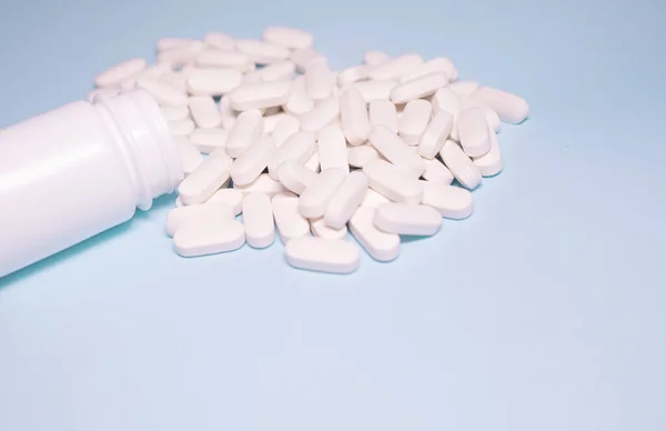 Medicine Bottle Pills Spilled Light Blue Background Medicines Prescription Pills — Stok fotoğraf
