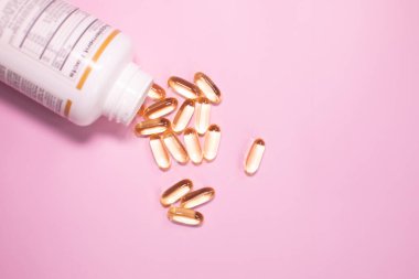 Oil filled capsules of food supplements: fish oil, omega 3, omega 6, omega 9, vitamin A, vitamin D3, vitamin E, borage oil. 