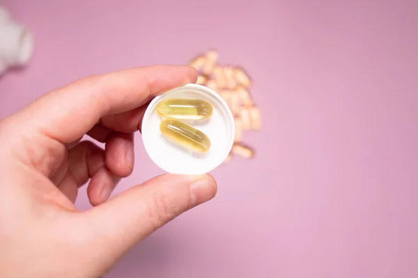 Oil filled capsules of food supplements: fish oil, omega 3, omega 6, omega 9, vitamin A, vitamin D3, vitamin E, borage oil.