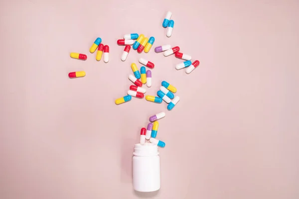 Pills on beige background. Medicines and prescription pills background