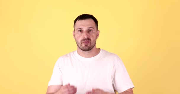 Young Man Blowing Kisses Sending Kisses Love Yellow Background — Stock Video
