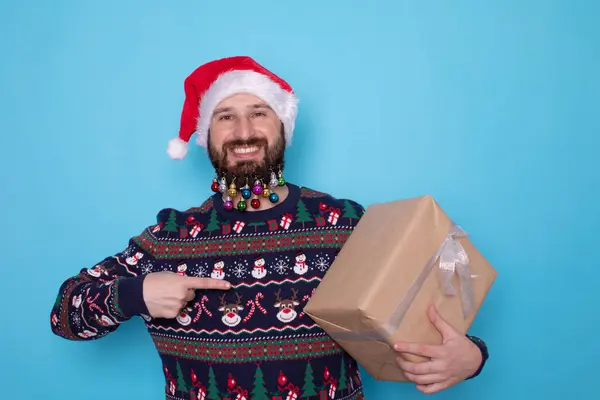 Attractive Bearded Man Santa Hat Gift Box Blue Background Christmas — Stock Photo, Image