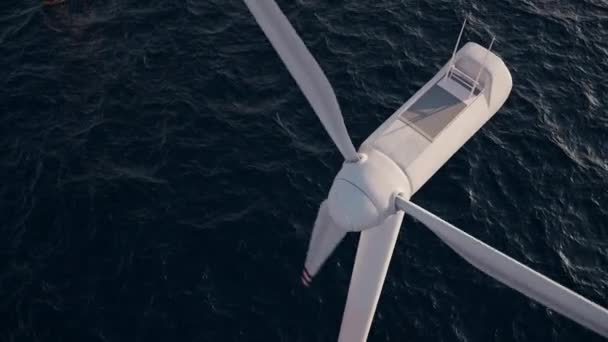 海洋の風力タービン カメラは風力タービンの頭部の周りをパンパンして 大きな沖合風力発電所の素晴らしい空中眺めを明らかにします 緑と再生可能エネルギーのコンセプト ウルトラHd 3840X2160アニメーション — ストック動画