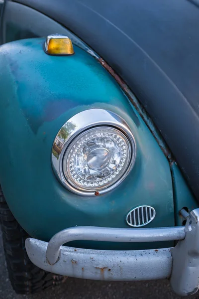 Classic car headlights close-up. Headlight lamp vintage classic car. Nobody, selective focus