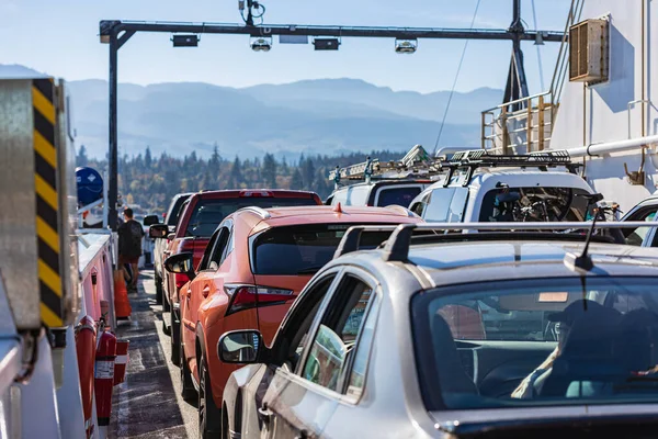 Rows of parked cars on a ferry ship. Cars parked on a ferry Britsh Columba, Canada-October 2,2023. Travel photo