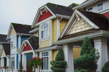 Residential townhouses. Modern apartment buildings in BC Canada. Modern complex of apartment buildings. Concept of real estate development, house for sale and housing market. Nobody, street photo