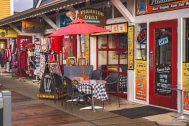 Shops and restaurants on the steveston pier. Pierside view. Nobody, streetphoto, editorial-Steveston-Canada,23,2023