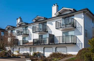 New residential townhouses. Modern apartment buildings in Canada. Modern complex of apartment buildings. Concept of real estate development, house for sale and housing market