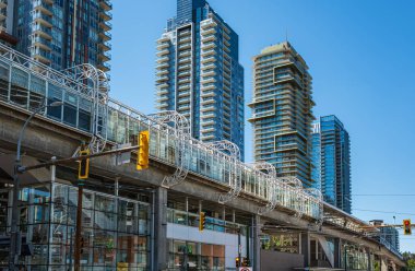 View of Skytrain station Metrotown, Vancouver City, BC, Canada. Modern downtown of Burnaby city on a sunny summer day-July 19,2023. Travel photo, editorial, street view