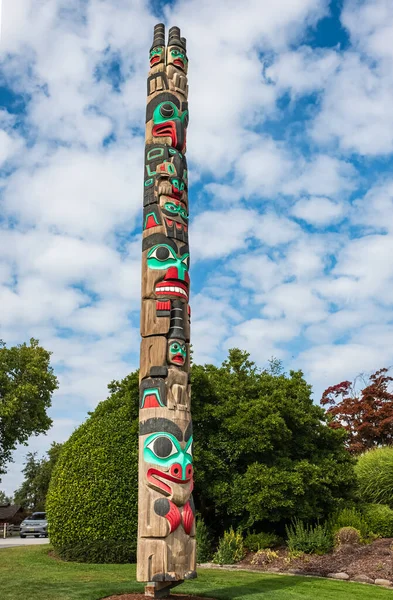 Totem pole by North American Native indians. Totem poles are monumental sculptures carved by indigenous peoples of the Pacific Northwest Coast of North America. Totem pole of the first nations Canada