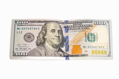 Benjamin Franklin 'in 100 dolarlık yeni baskıdan portresi. Para birimi Amerikan doları banknotları yakın plan. 100 Amerikan doları yeniden tasarlandı. 100 doların değeri.