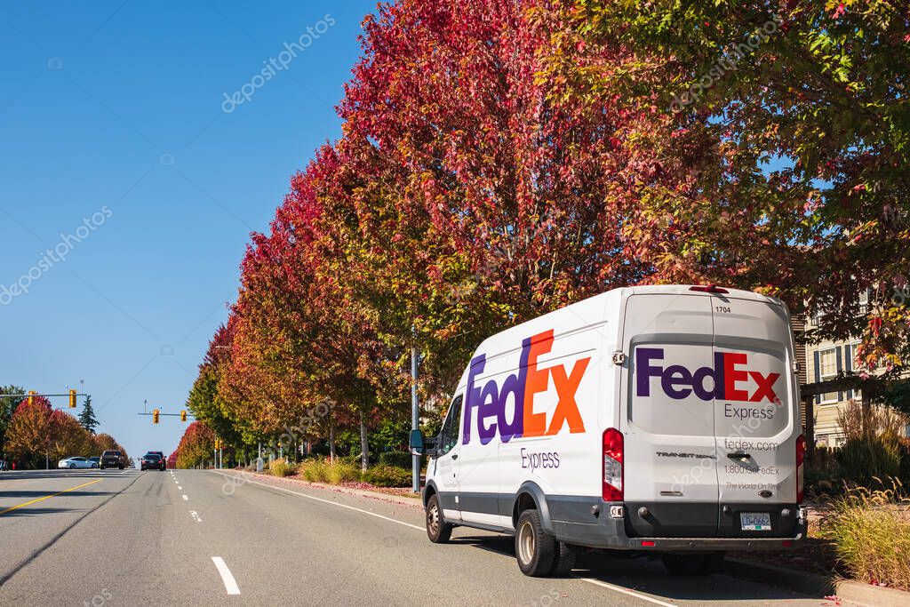 FedEx Delivery Truck Van Parked On Vancouver street Canada. FedEx Corporation Is An American Multinational Courier Delivery Services Company, largest package delivery companies worldwide-Sept 22,2023