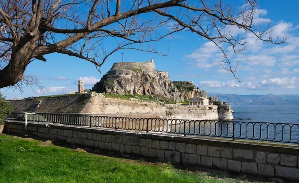 Old fortress of Corfu island, Greece. Old fortress walls and clock tower Kerkyra city, Corfu, Greece. The Old Fortress of Corfu is a Venetian fortress in the city of Corfu.