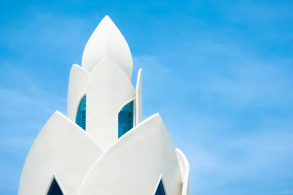 stock image Tram Huong Tower Lotus tower, which is located in the centre of the city, is considered as the symbol of Nha Trang city. Travel photo, nobody, blue sky background-April 4,2024