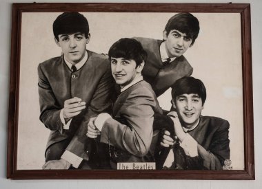 Vintage photo Portrait of The Beatles musical band group. Old textured vintage black and white photograph 1960s-70s. The Beatles' photo on the wall of restaurant Phuket Thailand-July 24,2024-Editorial clipart