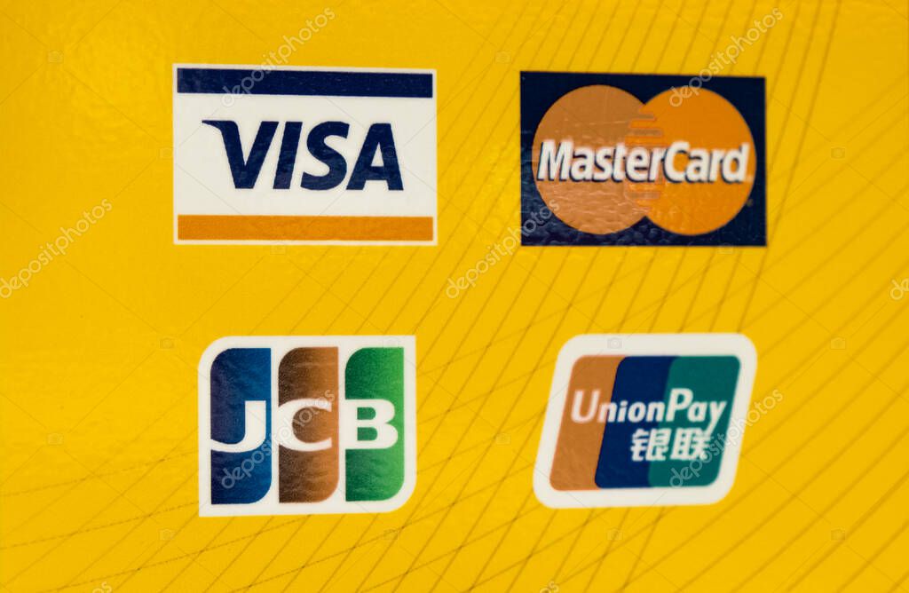 Modern credit methods. Payment methods symbols on a wall outside a store. It shows Visa, Master card, JCB sign, Union Pay. Close up, selective focus, nobody-Phuket Thailand-July 25,2024