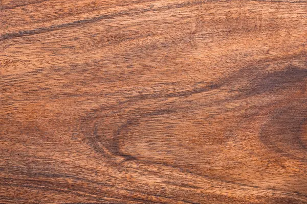 Gerçek doğal ahşap doku malzemesi. Tahtanın desenli yüzeyi. Ahşap zemin ya da eski tahtalardan yapılmış doku. Zengin koyu ahşap yapılı..