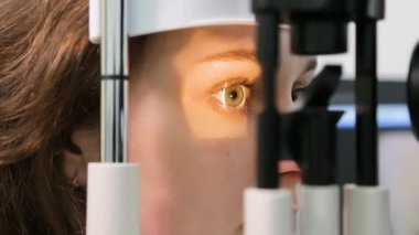 KYIV, UKRAINE - JANUARY 16, 2022: Eyeglasses selection on modern diagnostic equipment in an ophthalmic clinic. Modern diagnostic equipment in ophthalmic clinic - editorial footage