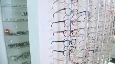 KYIV, UKRAINE - JANUARY 16, 2022: Eyeglasses selection on modern diagnostic equipment in an ophthalmic clinic. Modern diagnostic equipment in ophthalmic clinic - editorial footage
