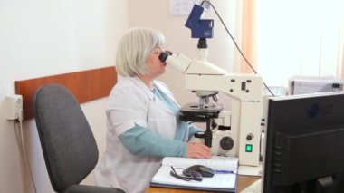 KYIV, UKRAINE - FEBRUARY 8, 2022: Prenatal Genetic Laboratory. Study of genetic materials of pregnant women. Electron microscope. Genetic research. Genetics Lab - editorial footage