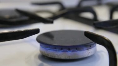 Gas burner. The kettle is placed on the gas stove. 